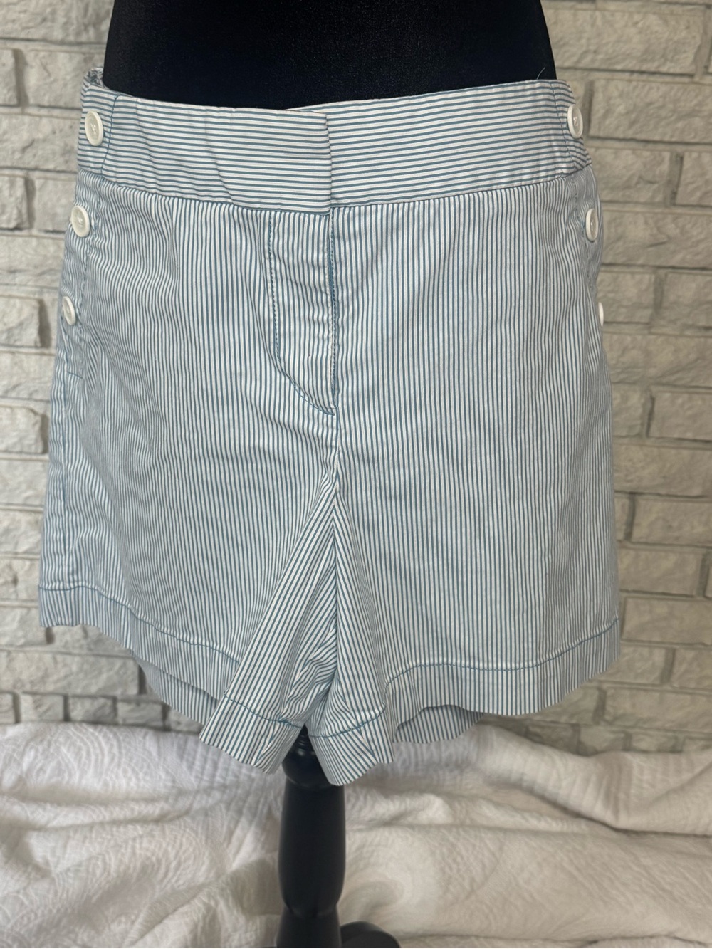 Loft, blue and white striped shorts, button detail.
Size 14